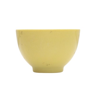 Lot 656 - A Chinese monochrome yellow-glazed wine cup, 20th century, Yongzheng mark