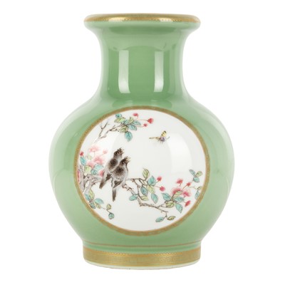 Lot 453 - A Chinese famille-rose lime green-ground 'bird and flower' vase, mid-20th century