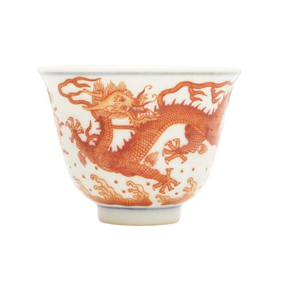 Lot 764 - A Chinese iron-red 'dragon' cup, 20th century, Guangxu mark