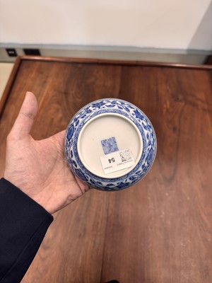 Lot 54 - A Chinese Ming-style blue and white 'lotus bouquet' saucer, Qing dynasty, Daoguang mark and of the period