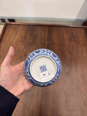 Lot 54 - A Chinese Ming-style blue and white 'lotus bouquet' saucer, Qing dynasty, Daoguang mark and of the period