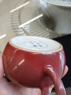 Lot 48 - A Chinese monochrome copper-red teapot, Yongzheng mark and possibly of the period