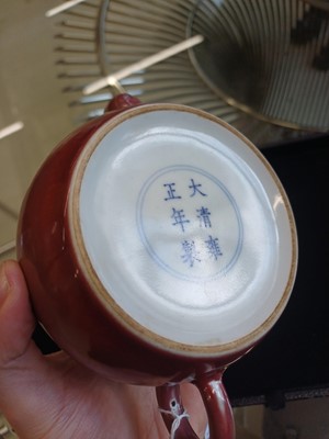 Lot 48 - A Chinese monochrome copper-red teapot, Yongzheng mark and possibly of the period