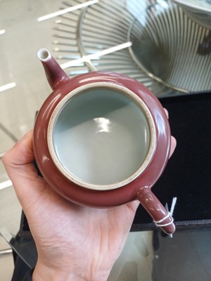 Lot 48 - A Chinese monochrome copper-red teapot, Yongzheng mark and possibly of the period
