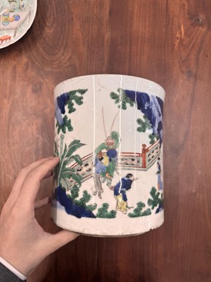 Lot 42 - A large Chinese wucai 'Washing the Elephant' brush pot, bitong, Transitional period