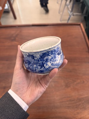 Lot 93 - A Chinese blue and white 'dragon and carp' censer, Qing dynasty, 18th century