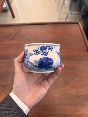 Lot 93 - A Chinese blue and white 'dragon and carp' censer, Qing dynasty, 18th century