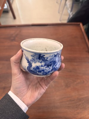 Lot 93 - A Chinese blue and white 'dragon and carp' censer, Qing dynasty, 18th century