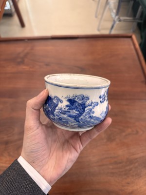 Lot 93 - A Chinese blue and white 'dragon and carp' censer, Qing dynasty, 18th century