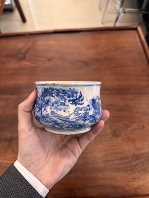 Lot 93 - A Chinese blue and white 'dragon and carp' censer, Qing dynasty, 18th century