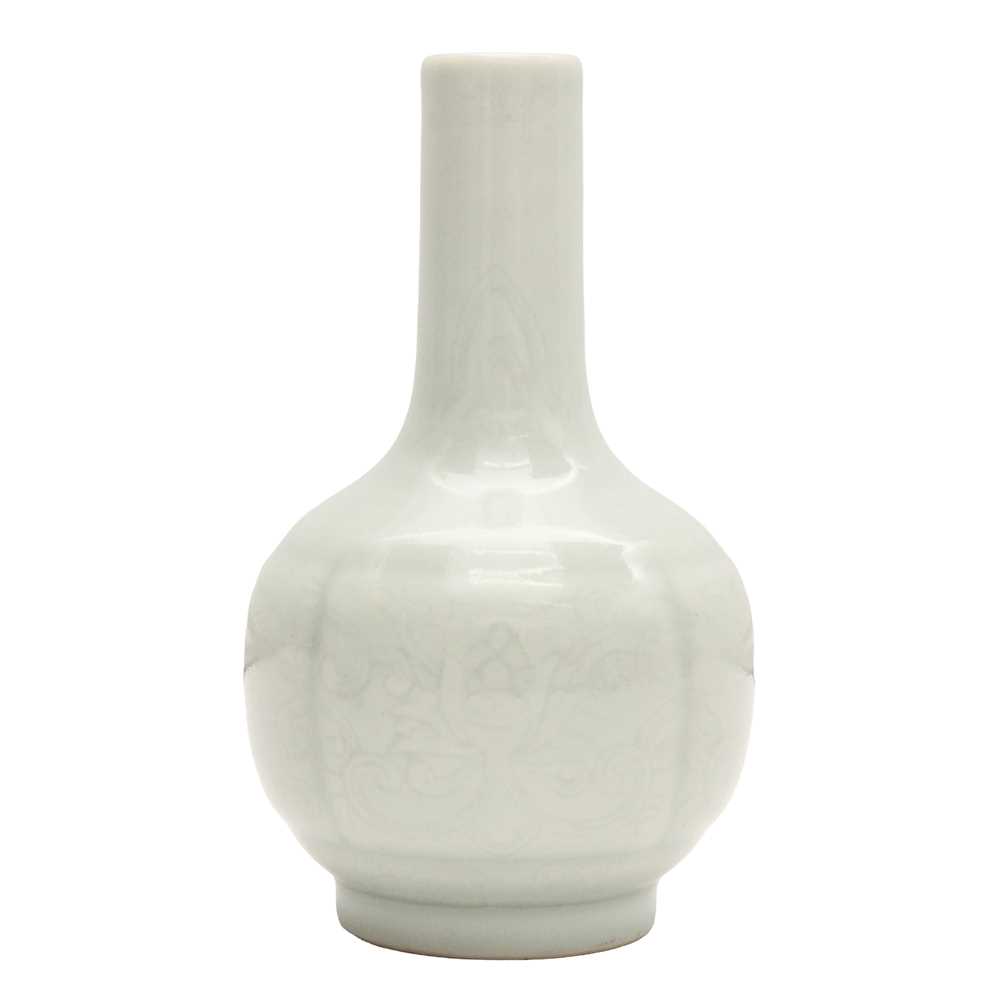 Lot 52 - A small Chinese monochrome white-glazed incised vase, Qing dynasty, Qianlong mark and period