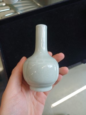Lot 52 - A small Chinese monochrome white-glazed incised vase, Qing dynasty, Qianlong mark and period