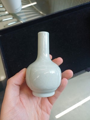 Lot 52 - A small Chinese monochrome white-glazed incised vase, Qing dynasty, Qianlong mark and period