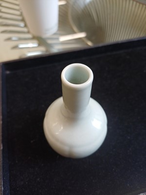 Lot 52 - A small Chinese monochrome white-glazed incised vase, Qing dynasty, Qianlong mark and period