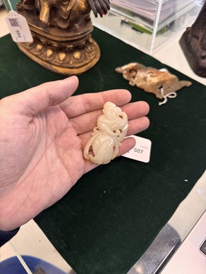 Lot 507 - A Chinese celadon jade 'dancer' carving, 20th century