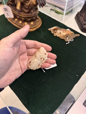 Lot 507 - A Chinese celadon jade 'dancer' carving, 20th century