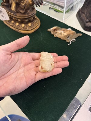 Lot 507 - A Chinese celadon jade 'dancer' carving, 20th century