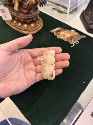 Lot 507 - A Chinese celadon jade 'dancer' carving, 20th century