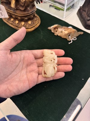 Lot 507 - A Chinese celadon jade 'dancer' carving, 20th century