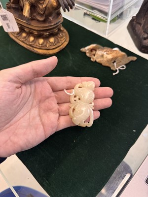Lot 507 - A Chinese celadon jade 'dancer' carving, 20th century