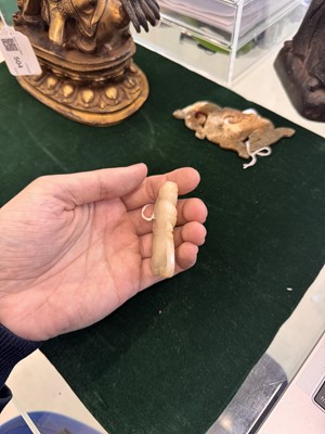 Lot 507 - A Chinese celadon jade 'dancer' carving, 20th century