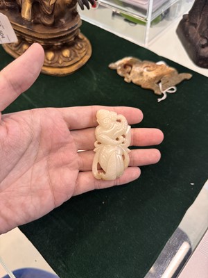 Lot 507 - A Chinese celadon jade 'dancer' carving, 20th century