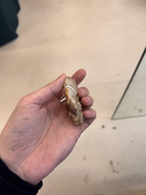 Lot 508 - A Chinese archaistic jade 'dragon' carving, 19th-20th century