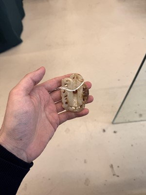Lot 508 - A Chinese archaistic jade 'dragon' carving, 19th-20th century