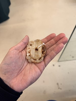 Lot 508 - A Chinese archaistic jade 'dragon' carving, 19th-20th century