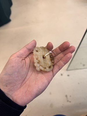 Lot 508 - A Chinese archaistic jade 'dragon' carving, 19th-20th century