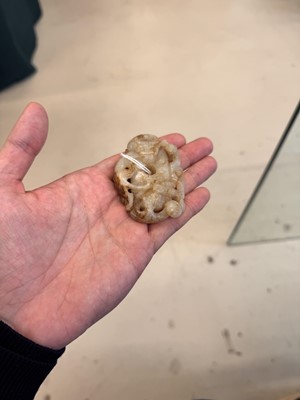 Lot 508 - A Chinese archaistic jade 'dragon' carving, 19th-20th century