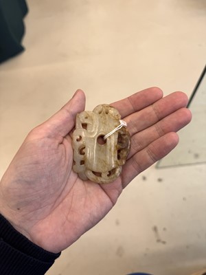 Lot 508 - A Chinese archaistic jade 'dragon' carving, 19th-20th century