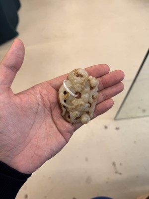 Lot 508 - A Chinese archaistic jade 'dragon' carving, 19th-20th century