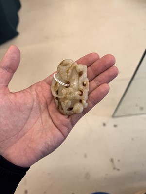 Lot 508 - A Chinese archaistic jade 'dragon' carving, 19th-20th century