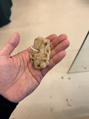 Lot 508 - A Chinese archaistic jade 'dragon' carving, 19th-20th century
