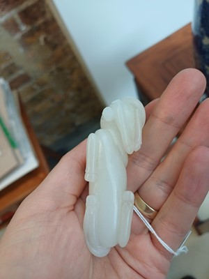 Lot 509 - A Chinese white jade 'horses' carving, late Qing dynasty