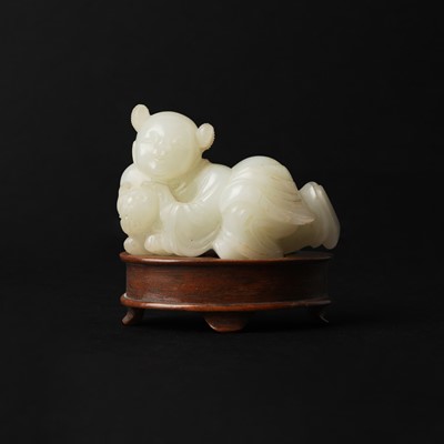Lot 106 - A Chinese jade 'boy and cat' carving, Qing dynasty, 19th century