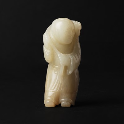 Lot 105 - A Chinese jade 'boy and lingzhi' carving, Qing dynasty, 18th-19th century