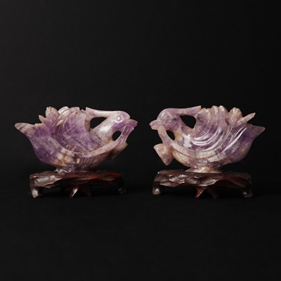 Lot 137 - A pair of Chinese amethyst 'bird' carvings, 19th/20th century