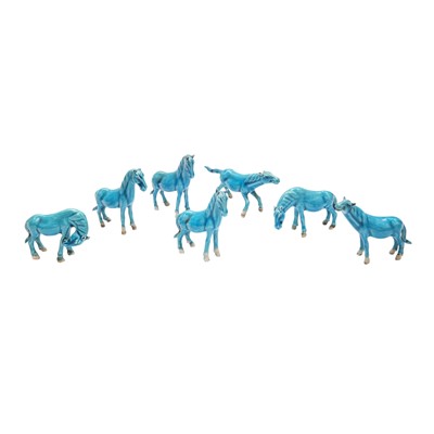 Lot 654 - Seven Chinese monochrome turquoise-glazed 'Mu Wang' horse figures, Republic period