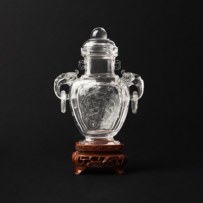 Lot 139 - A Chinese rock crystal 'lotus scroll' vase and cover, Qing dynasty, 19th century