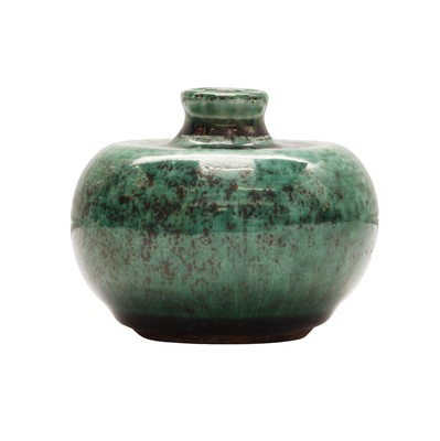 Lot 84 - A Chinese green-glazed water pot, pingguozun, Qing dynasty, 18th/19th century