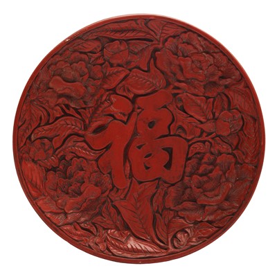 Lot 216 - A Chinese lacquered 'peony' dish, 19th/20th century, Qianlong mark