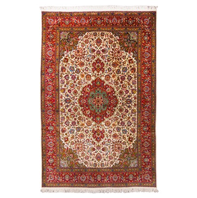 Lot 68 - An identical very fine part silk Tabriz carpet, north-west Persia