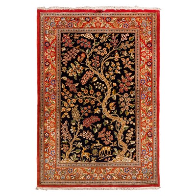 Lot 69 - An extremely fine, signed part silk Qum rug, central Persia