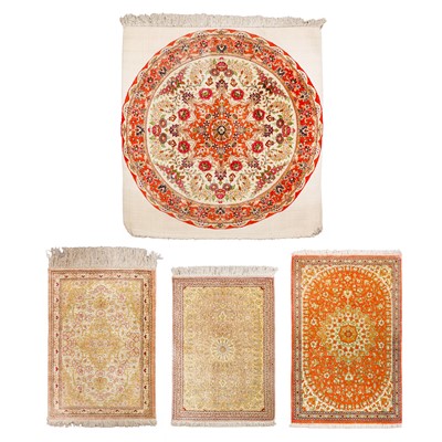 Lot 22 - A lot of four extremely fine silk Qum small rugs, central Persia