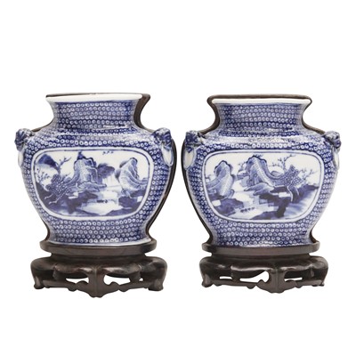 Lot 345 - A pair of Chinese blue and white flat-back wall vases, Qing dynasty, 19th century
