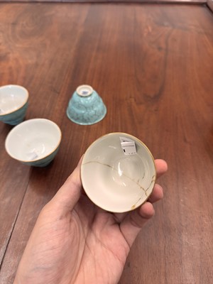 Lot 51 - Four Chinese turquoise-enamelled ogee wine cups, Qing dynasty, Qianlong marks and period
