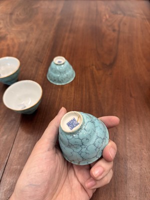 Lot 51 - Four Chinese turquoise-enamelled ogee wine cups, Qing dynasty, Qianlong marks and period