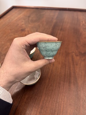 Lot 51 - Four Chinese turquoise-enamelled ogee wine cups, Qing dynasty, Qianlong marks and period